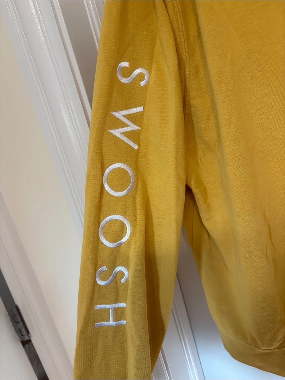 Nike Men’s Crewneck Sweatshirt in Mustard Yellow with White Swoosh Sleeve